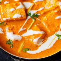 Paneer Butter Masala · Paneer cubes steamed with tomato creamy butter sauce. Served with Basmati rice.
