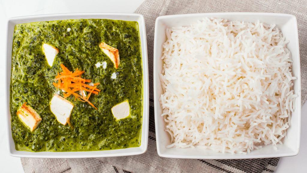 Palak Paneer · Creamy spinach sauce cooked with cottage cheese and mild spices. Served with Basmati rice.