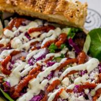 Roasted Chicken Döner Salad · Served over local mixed greens: This keto-friendly bowl is offered with your choice of succu...