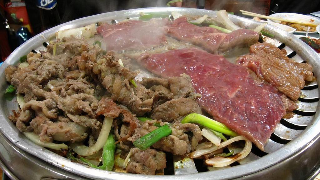 M-38. Ttukbaegi Bulgogi · House special soy sauce marinated beef in an earthenware pot.