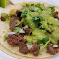 Street Tacos ,Tacos Regulares · ONIONS ,CILANTRO, GUACAMOLE,LIMES AND RADISH 
CEBOLLA,CILANTRO,GUACAMOLE,LIMON Y RABANOS