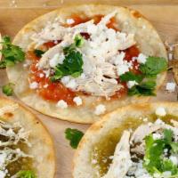 Chalupas De Carne Enchilada · chalupas come in 3  
corn tortillas fried in grille , and then topped simply with salsa,  me...