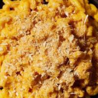 Mac And Cheese · Macaroni prepared with freshly made cheese sauce, and bread crumbs.