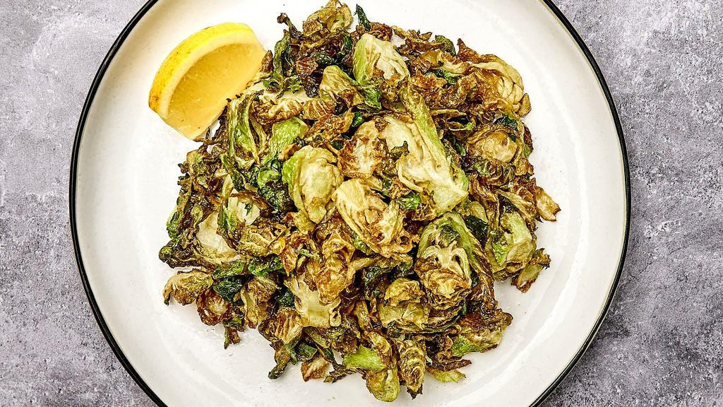 Crispy Brussels Sprouts · Crispy fried brussels sprouts with lemon and salt.
