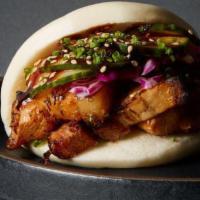 Original Pork Belly Bao · Braised pork belly, cabbage, peanuts, black sesame seeds, and your choice of sauce