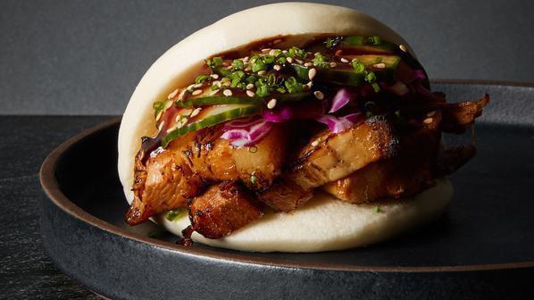 Original Pork Belly Bao · Braised pork belly, cabbage, peanuts, black sesame seeds, and your choice of sauce