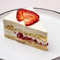 Tres Leches Cake With Strawberries · Soft and ultra moist sponge cake soaked with a condensed milk, evaporated milk, and cream wi...