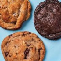 Dozen Assorted Monster Cookies · includes classic chocolate chip, double chocolate, & peanut chip monster cookies