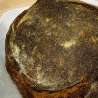 Miche · rustic whole wheat sourdough - large format loaf sold by the quarter