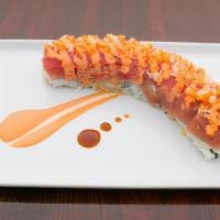 Pink Roll · Spicy. Eight pieces. Inside special salmon, cucumber, and tempura. Topped with tuna and temp...