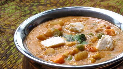 Navratan Korma · Gluten-free. Vegan. Mixed vegetables cooked in delicate spices, tomatoes and onions.