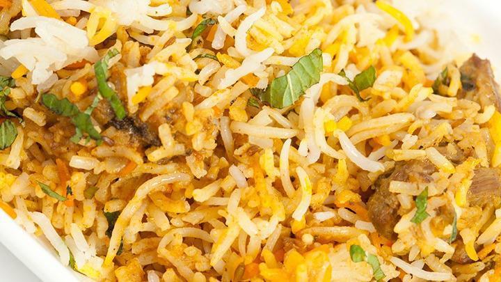 Lamb Biryani · Gluten-free. Selected royal portions of lamb cooked in herbs and spices with fragrant basmati rice.
