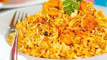 Shrimp Biryani · Gluten-free. Shrimp cooked in herbs and spices with fragrant basmati rice.