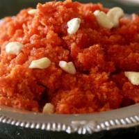 Gajar Halwa · Gluten-free. Shredded carrots cooked in milk with nuts.