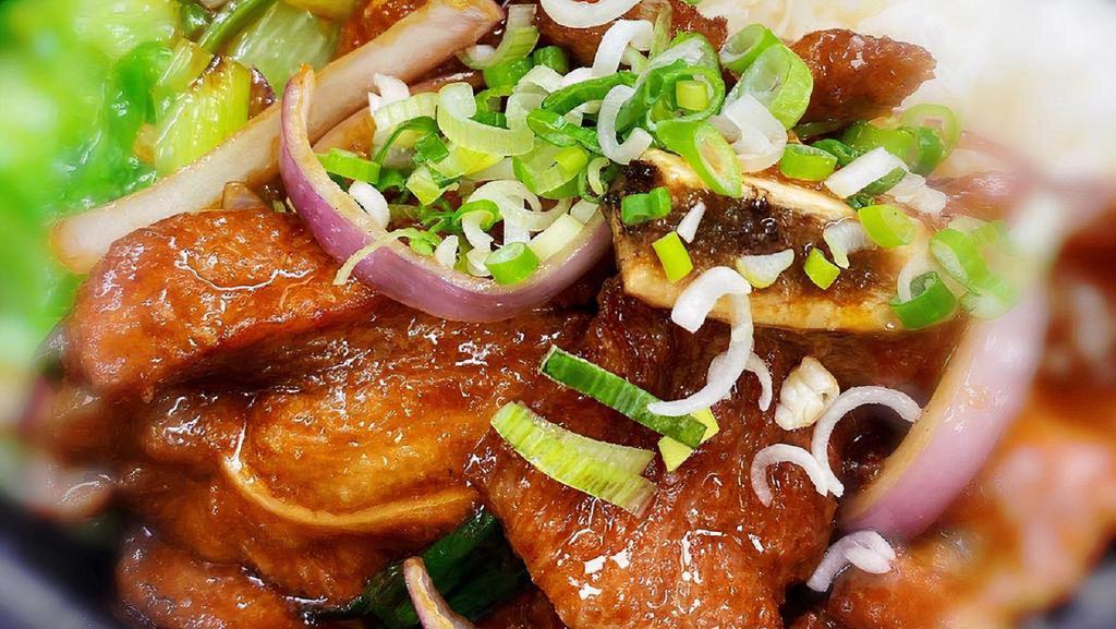 Pork Chop With Onion On Rice 洋蔥豬扒飯 · 