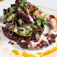 Grilled Octopus · Crispy quinoa, shaved fennel, black olives, and sesame oil.