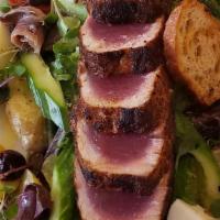 Tuna Nicoise · Seared tuna, egg, black olives, fingerling potato, anchovy, cucumber, French beans, mixed gr...