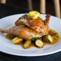 Roasted Half Organic Chicken · Half roasted organic chicken. Served au jus with roasted fingerling potatoes and wilted spin...