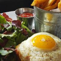 Croque Madame · Country Ham, Béchamel, Gruyere , Brioche, Egg, served with Pomme Frites and Market Greens