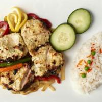Chicken Malai Kabab · Tender  chicken marinated in a special creamy sauce with mild spices & herbs, served with si...