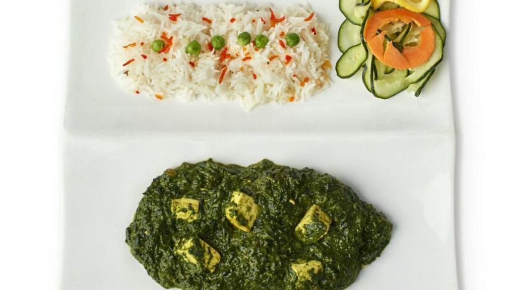 Saag Ponir · Spinach cooked with homemade cottage cheese in a mildly spiced cream sauce.