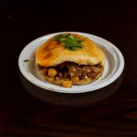 Bun Choley · Bun choley is the king when is it comes to vegetarian punjabi street food - baked buns fille...
