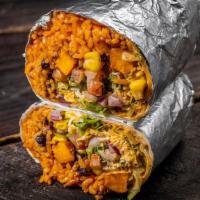 Steak Burrito · Brown Mexican Rice, Black Beans, Monterey Jack Cheese, Salsa Verde, Sour Cream, Fresh Cilant...