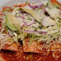 Enchiladas (2 Pieces) · Baked corn tortillas stuffed with chicken or steak and gratin cheese with our traditional re...