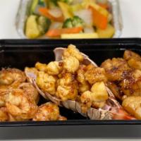 Seafood Combinations · Lobster tail, shrimp and scallops