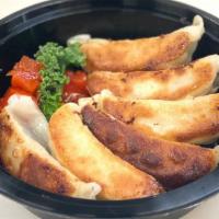 Gyoza · pan-fried  dumplings
Choice of: Vegetable or shrimp or chicken or pork