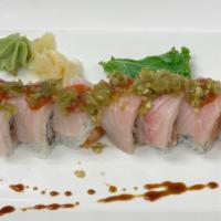 Fiesta Roll · Spicy salmon top with yellowtail jalapeno and sriracha.