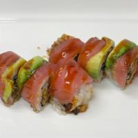 Red Eye Dragon Roll · Eel, cucumber, tobiko, tempura flakes top with avocado, tuna and eel sauce.