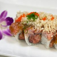 Tom Roll · Spicy assorted fish chopped, top with chopped assorted fish, tempura flakes, garlic sauce, s...