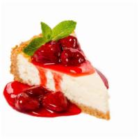 Strawberry Cheesecake · A rich and creamy New York style cheesecake with strawberries baked inside a honey-graham cr...