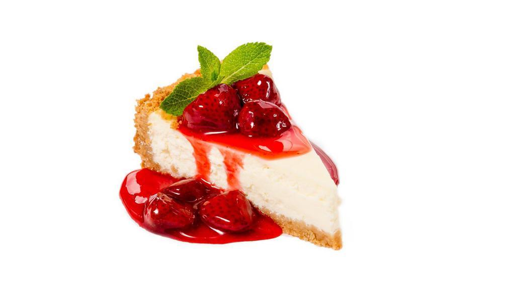 Strawberry Cheesecake · A rich and creamy New York style cheesecake with strawberries baked inside a honey-graham crust.