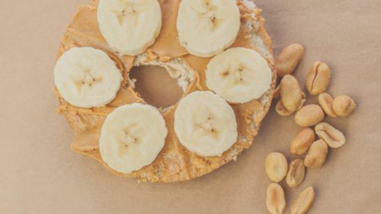 Bagel With Peanut Butter & Banana · Fresh bagel with peanut butter and slices of banana.