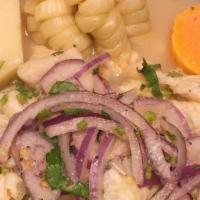 Ceviche De Pescado · Fish ceviche. Chunks of tilapia marinated in lime juice mixed with red onions, cilantro and ...