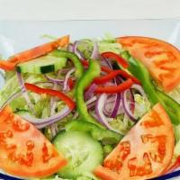 House Salad · Red leaf lettuce, cucumbers, tomato, red onions, and bell peppers with a side of our delicio...