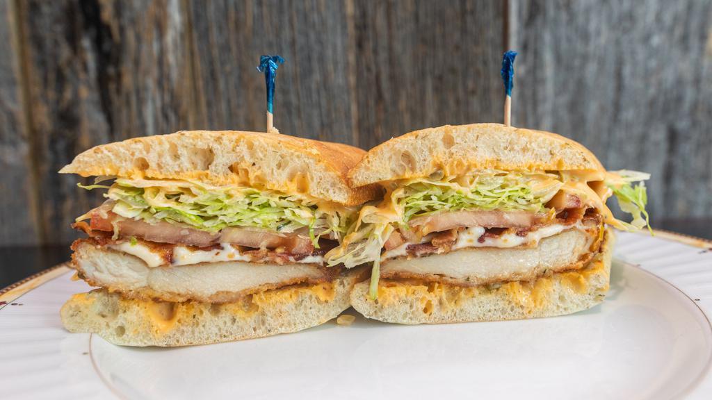 Chicken Cutlet On Rosemary Focaccia · Breaded chicken cutlet, fresh mozzarella, bacon, lettuce, tomato, and russian dressing.