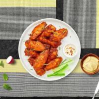 Chicken Wings · (6 pieces) Fresh chicken wings breaded and fried until golden brown.