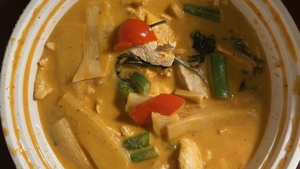 Red Curry · Spicy. Bamboo, bell peppers, string beans, and basil with coconut milk.