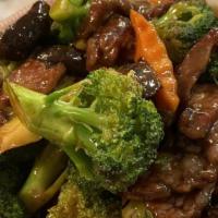 Beef With Broccoli · Served with white rice.