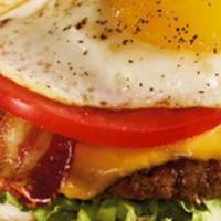 La Tejana Burger · Topped with smoked slab bacon, cheddar cheese, and fried egg.