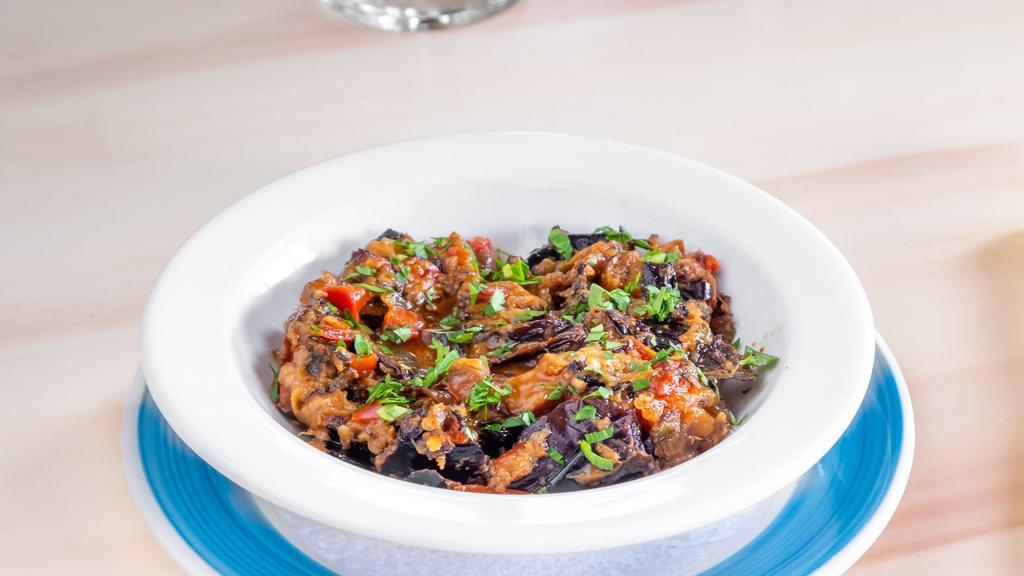 Eggplant Spread · New. Twice-Cooked Eggplant with Red Bell Pepper,
Onions, Parsley & Lemon