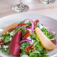 Red & White Pear Salad · Red and White Wine Poached Pears,
Baby Arugula, Pecans, Red Onions,
Goat Cheese & Pear Vinai...