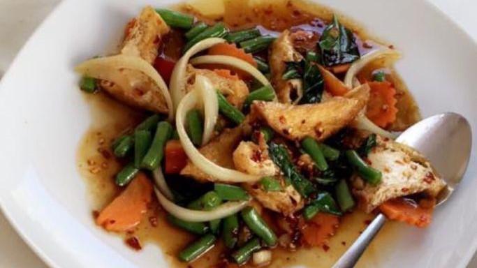 Spicy Basil · Spicy. The traditional dish of spicy seasoning mixed with garlic, mushroom, bell pepper, green beans and fresh Thai’s basil.