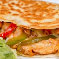Quesadilla · Jumbo homemade corn tortilla stuffed with cheese, meat, or vegetable, covered with lettuce, ...