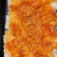 The Volcano Roll · Spicy. Melt in your mouth mixture of broiled scallops, tobiko, and spicy mayo, topped on a C...
