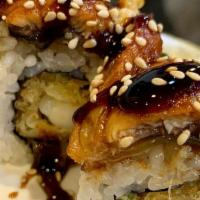 Dragon Roll · Fresh shrimp tempura and cucumber, topped with unagi and drizzled with sweet unagi glaze and...