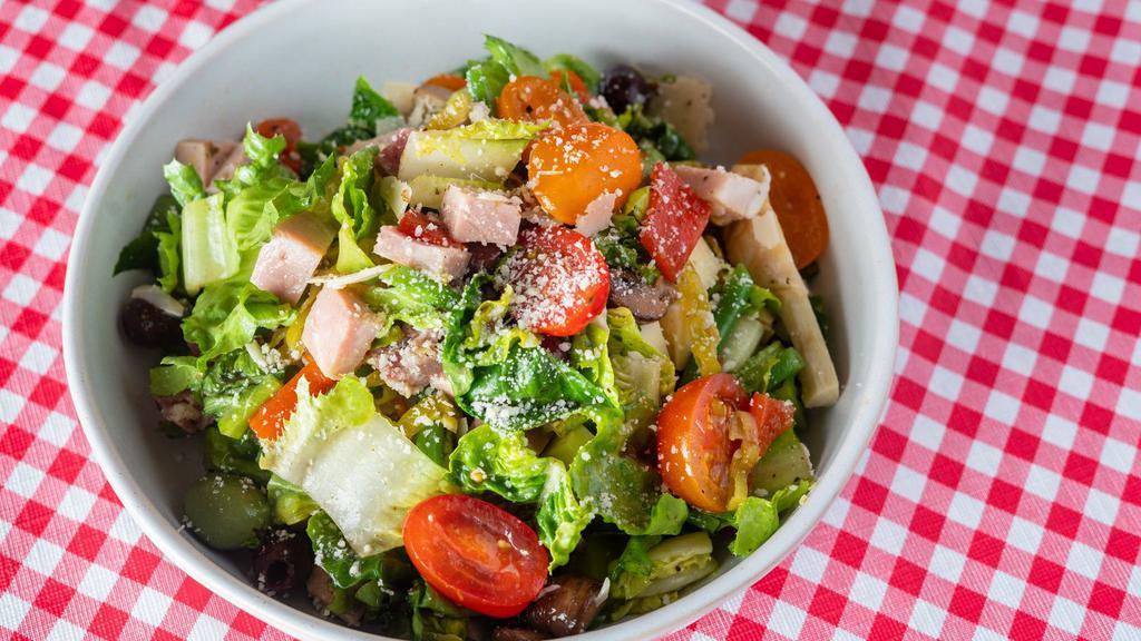 Chopped Antipasto · Gluten free. Gem lettuce, italian cured meats, provolone, artichokes, pepperoncini, roasted peppers, marinated mushrooms, green beans, cherry tomatoes, red wine vinaigrette.
